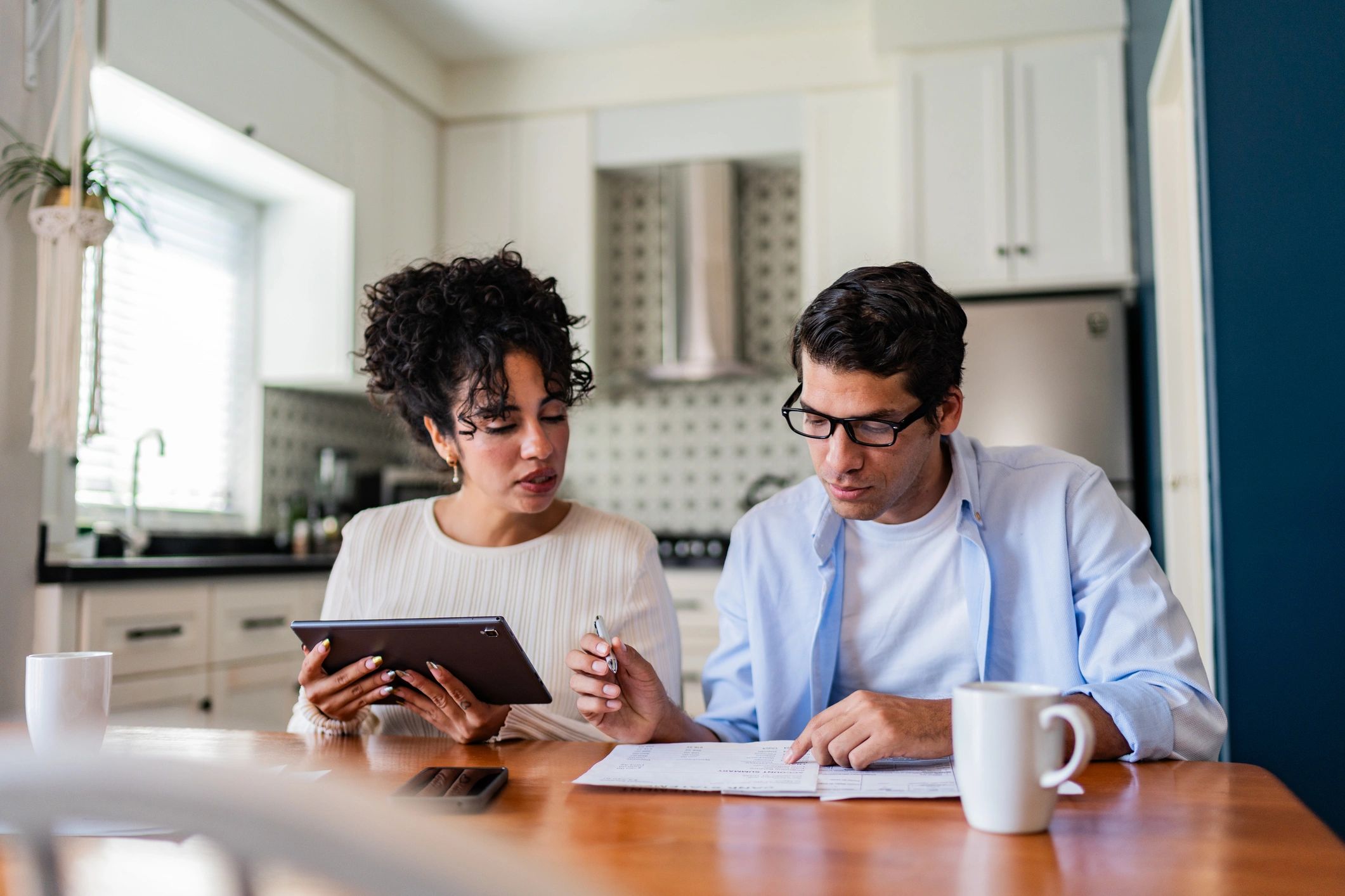 Couple reviewing finances for a home purchase